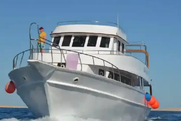 Manolo Tours boat heading to the Dolphin House in Hurghada.