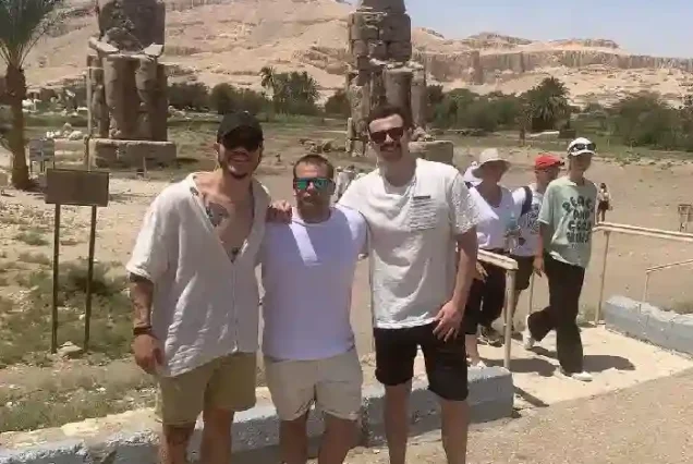 Colossi of Memnon stone statues guarded by Manolo Tours hurghada