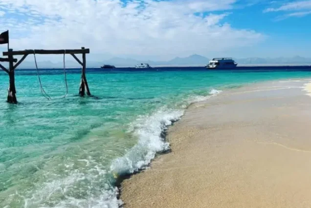 Hula Hula Island Hurghada white sandy beach and turquoise water.
